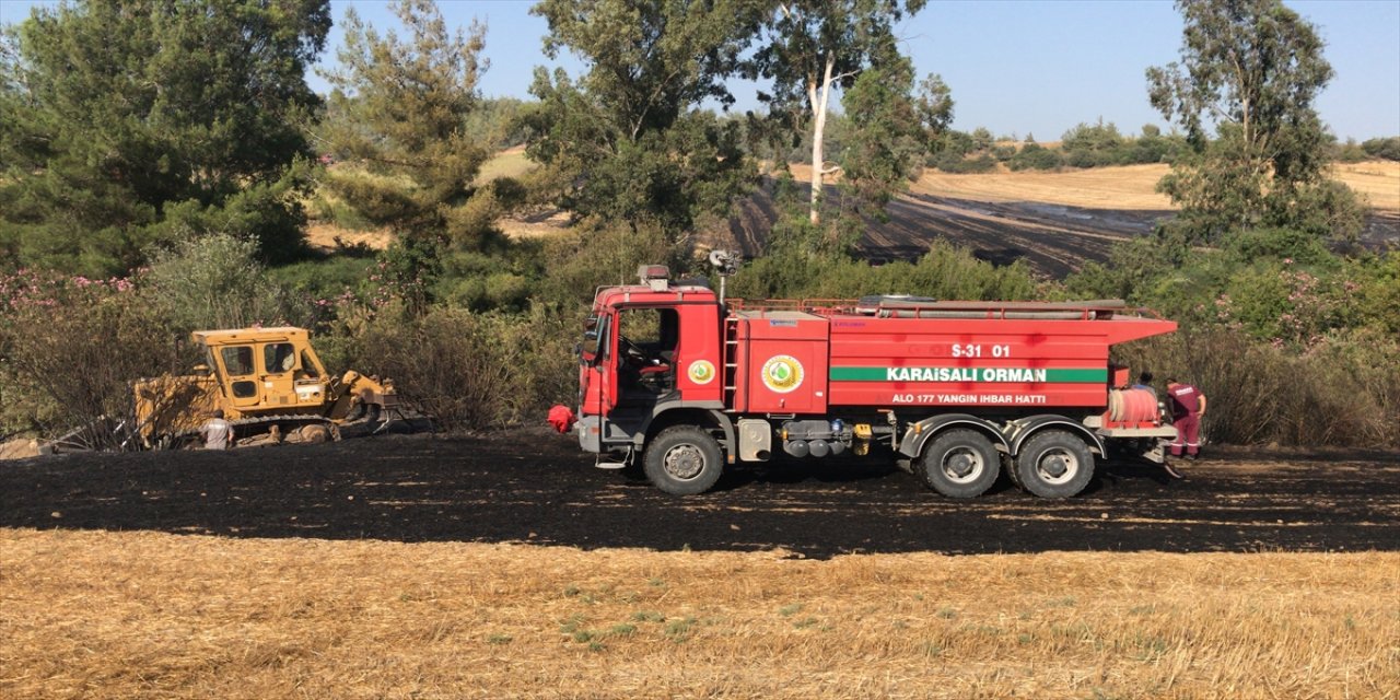Adana'da tarlada çıkıp ormanlık alana sıçrayan yangın kontrol altına alındı