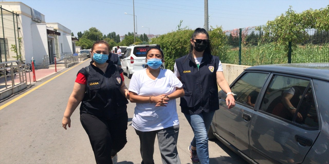 Adana'da iş yerine asılı Türk bayrağını koparıp çöpe atması kameraya yansıyan kadın tutuklandı