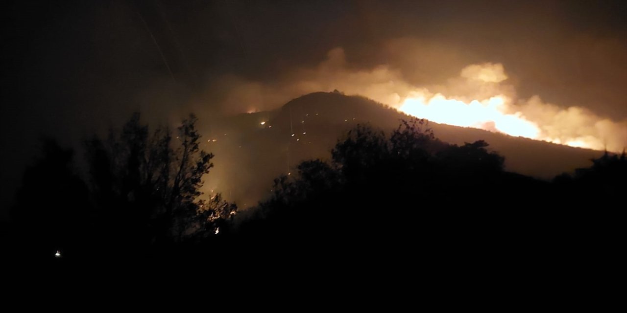 Denizli Buldan’da orman yangınına müdahale sürüyor: Dozer operatörü yaralandı, evler zarar gördü